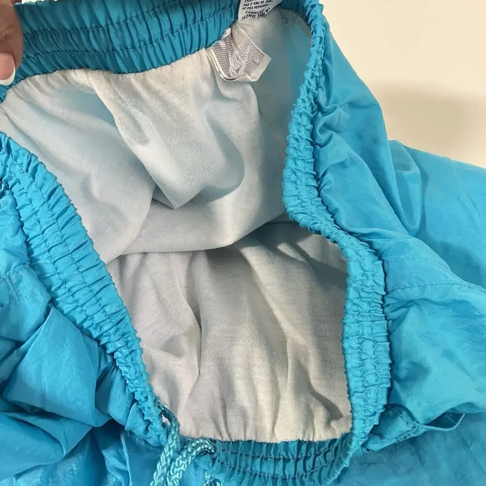 Vintage Nike Women’s Teal Nylon Windbreaker Track Pants Size L Lined 90’s